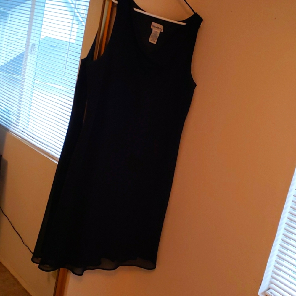 Simple, semi formal black dress. Plus size.